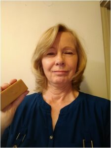 woman holding shampoo bar from MadeOn Skin Care